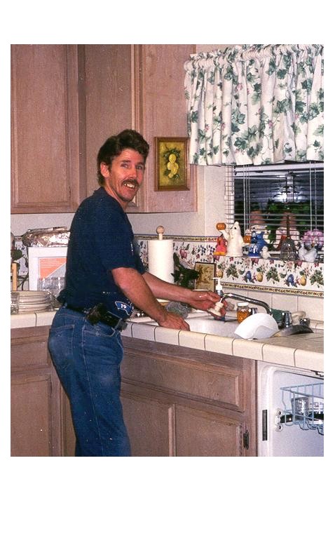 Mike doing dishes at my place. Thanksgiving 2000