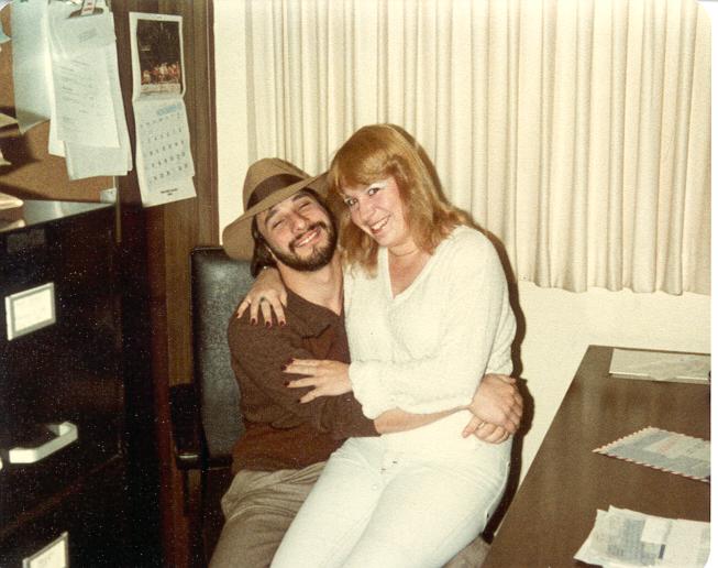 I'm sitting on Ted Solomon's lap. (November 1980)